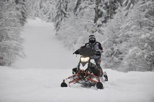 snowmobile on snow photo