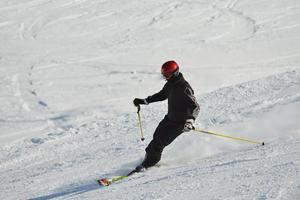 Skiers on mountain photo