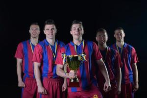 jugadores de fútbol celebrando la victoria foto