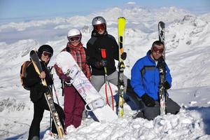 people group on snow at winter season photo