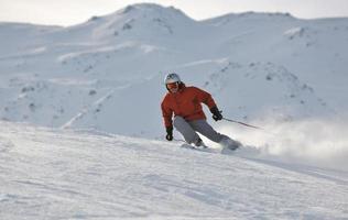 skiing on on now at winter season photo