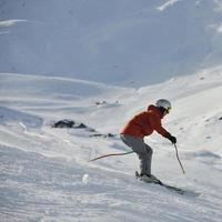 skiing on on now at winter season photo