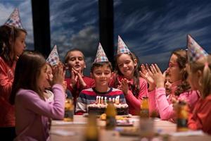 young boy having birthday party photo