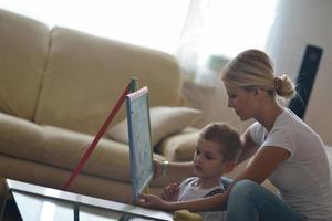 family drawing on school board at home photo