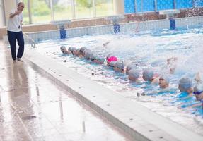 children group  at swimming pool photo