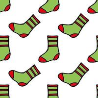 Seamless pattern with creative red and green socks on white background. Vector image.