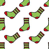 Seamless pattern with creative red and green socks on white background. Vector image.