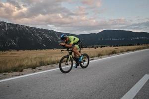 triathlon athlete riding bike photo