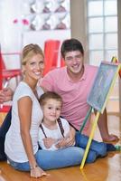 family drawing on school board at home photo