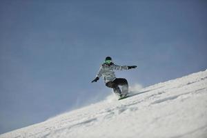 Skiers on mountain photo