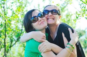 woman pragnant outdoor with friend photo