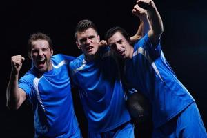 soccer players celebrating victory photo