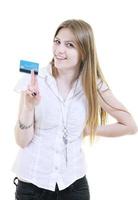 young woman hold credit card photo