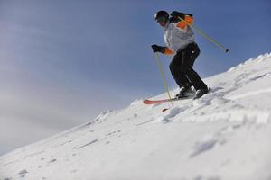 Skier on mountain photo