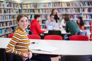 student taking notes for school class photo