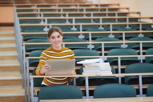 student taking notes for school class photo