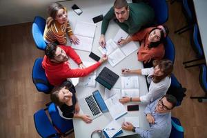 students use modern technology for a school project photo