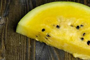 slices of sweet yellow watermelon photo