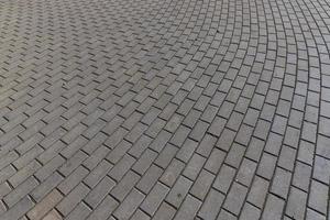 part of the road made of concrete tiles photo