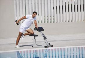 Exercising by pool photo