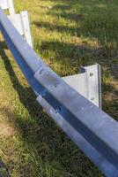 Metal fencing on the highway for safety photo