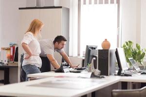 designers in office at the wooden furniture manufacture photo