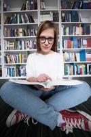 Student studying in library photo