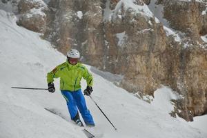 Skiers on mountain photo