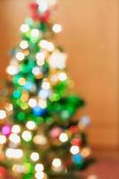 Christmas tree with bokeh light blur background photo