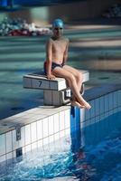 child portrait on swimming pool photo