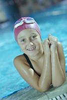 happy child on swimming pool photo