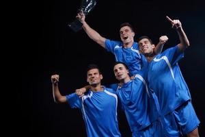 soccer players celebrating victory photo