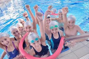 children group  at swimming pool photo