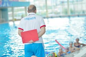 children group  at swimming pool photo