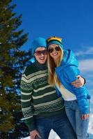 Young Couple In Winter  Snow Scene photo