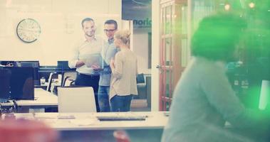 Startup Business Team At A Meeting at modern office building photo