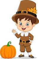 Cute little pilgrim boy cartoon with pumpkin vector