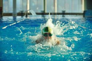 Swimmer in pool photo