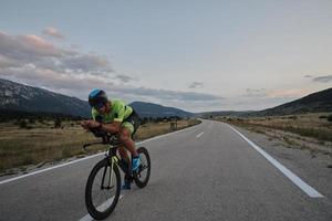 triathlon athlete riding bike photo