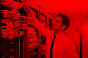 it engineers in network server room photo