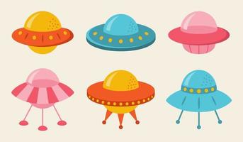 Collection of flat cute flying saucers for kids. Childish spaceships in cartoon style. vector