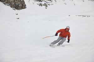 skiing on on now at winter season photo