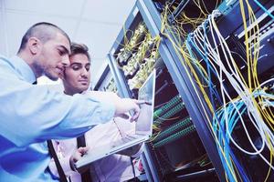 it enineers in network server room photo