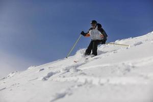 Skier on mountain photo