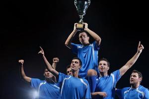 soccer players celebrating victory photo