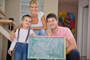 family drawing on school board at home photo