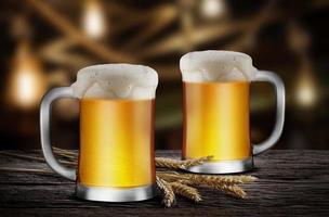 Two Glasses of Light Beer with wheat on the wooden table in the restaurant, with copy space for your text photo