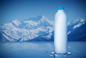 Pure mineral water bottle with water drops in the iceberg background, Healthcare and beauty hydration concept photo