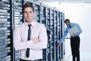 it enineers in network server room photo