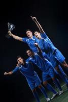 jugadores de fútbol celebrando la victoria foto